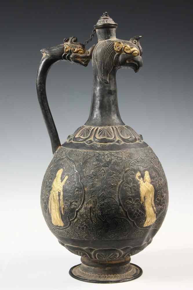 Appraisal: CHINESE EWER - Rare silver Tang dynasty ewer with gilded