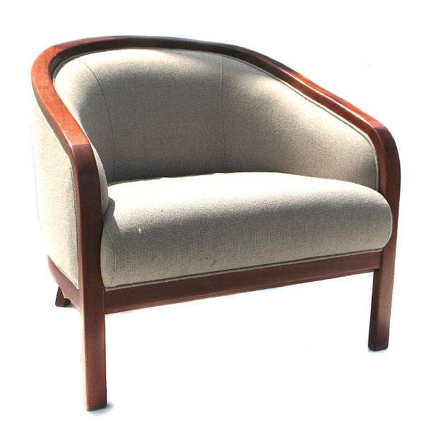 Appraisal: An Art Deco mahogany upholstered armchair height in width in