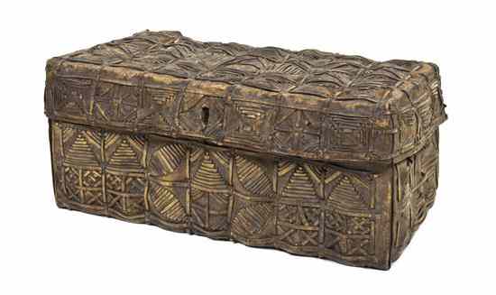 Appraisal: A Woven Hide Trunk the rectangular lid over a conforming