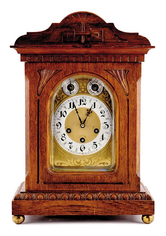 Appraisal: Junghans oak chiming mantel clock Germany circa a carved and