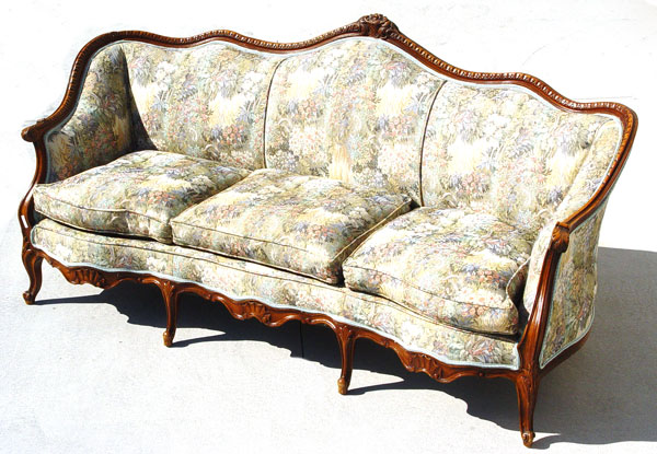 Appraisal: FRENCH STYLE CARVED FULL SIZE SOFA CA 'S Featuring upholstery