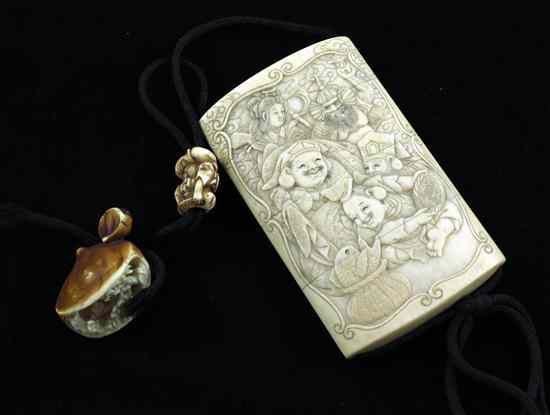 Appraisal: A Meiji period three-case ivory inro carved in relief with