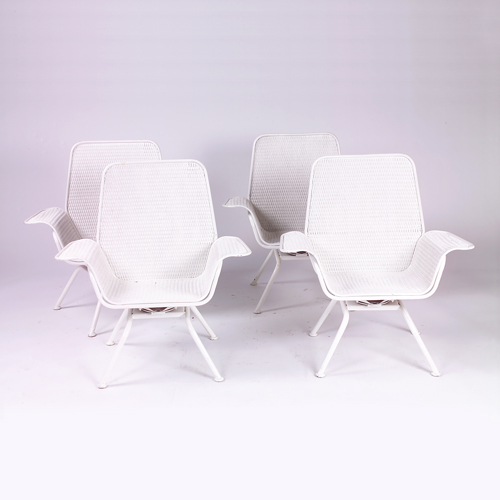 Appraisal: Set of four French wicker lounge chairs on tubular white