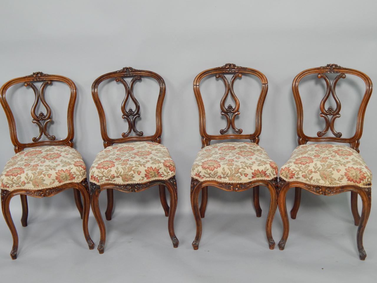 Appraisal: A set of four Victorian rosewood balloon back single dining