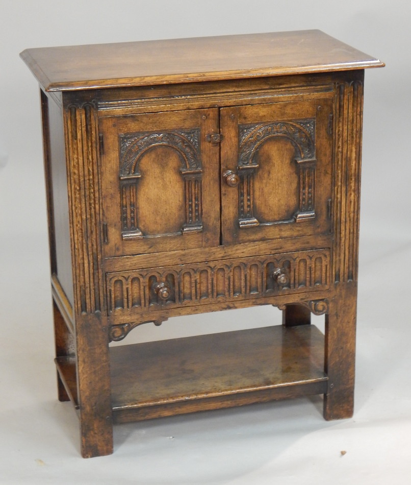 Appraisal: A Titchmarsh Goodwin side cabinet the rectangular top with a