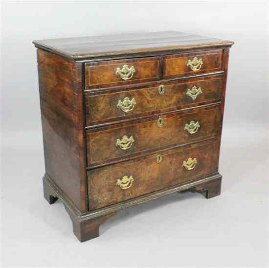 Appraisal: An early th century walnut and oak chest of five