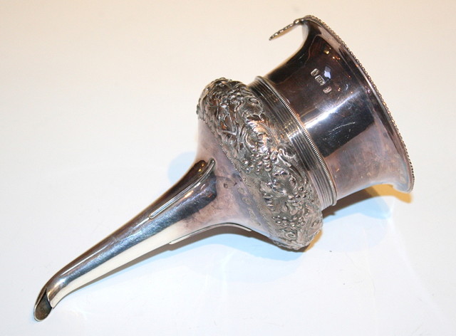 Appraisal: A GEORGE IV SCOTTISH SILVER WINE FUNNEL IN TWO PARTS