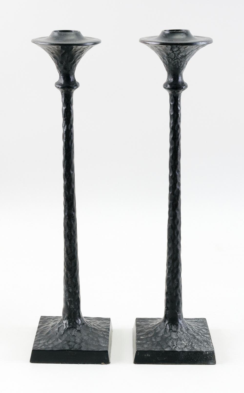 Appraisal: PAIR OF ARTS CRAFTS HAND-HAMMERED METAL CANDLESTICKS LATE TH CENTURY