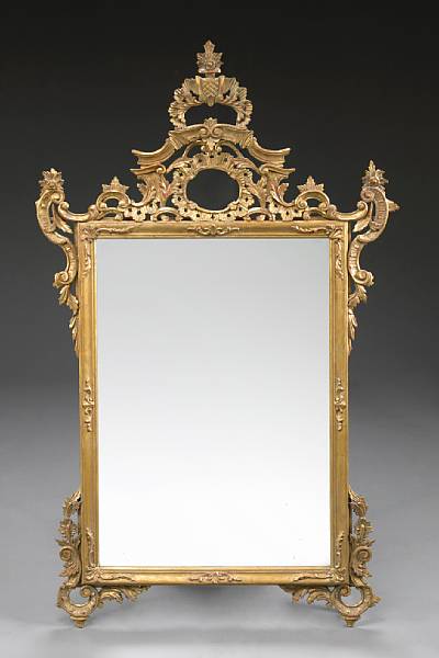 Appraisal: An Italian Neoclassical style giltwood mirror The rectangular plate within