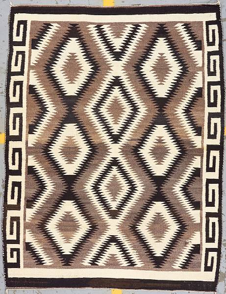 Appraisal: A Navajo Two Grey Hills rug size approximately ft in