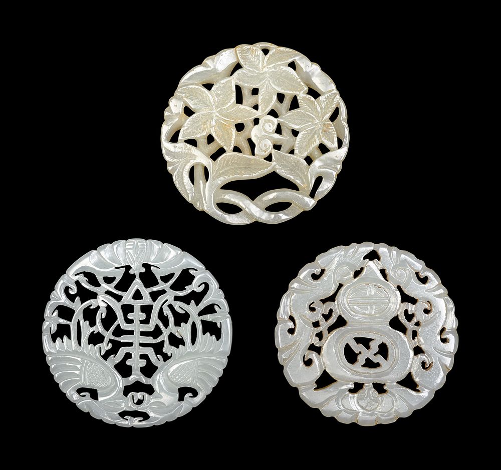 Appraisal: Three Chinese Pale Celadon Jade Circular Reticulated Plaques Three Chinese