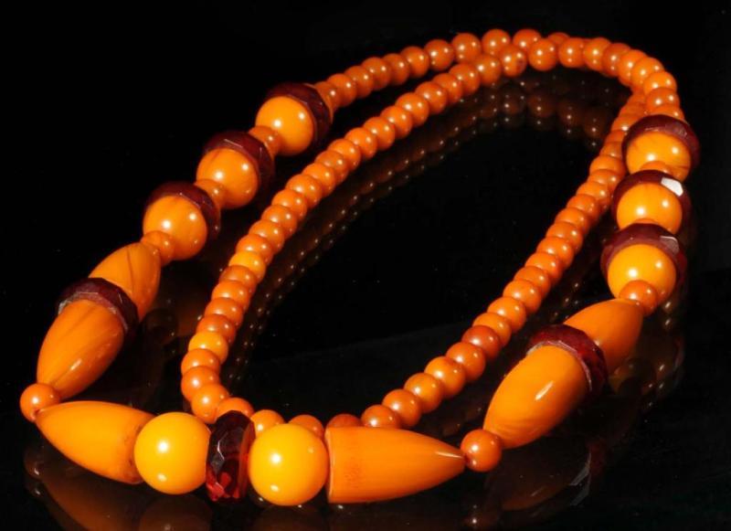 Appraisal: Bakelite Amber Root Beer Colored Necklace Description Unusual With faceted