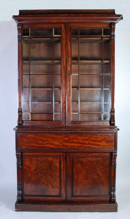 Appraisal: EARLY NINETEENTH CENTURY MAHOGANY SECRETAIRE BOOKCASE the stepped and moulded