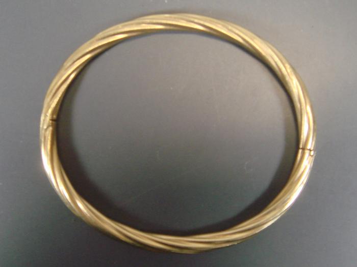 Appraisal: K YG spiral bengal gold bracelet x id dwt Estimate