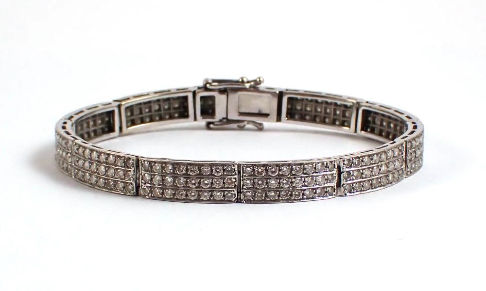 Appraisal: DIAMOND AND EIGHTEEN KARAT WHITE GOLD BRACELET measuring in length