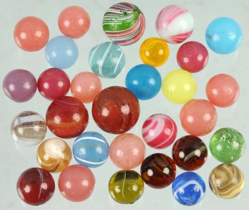 Appraisal: Lot of Early Hand-Made Marbles Description Includes some swirl and