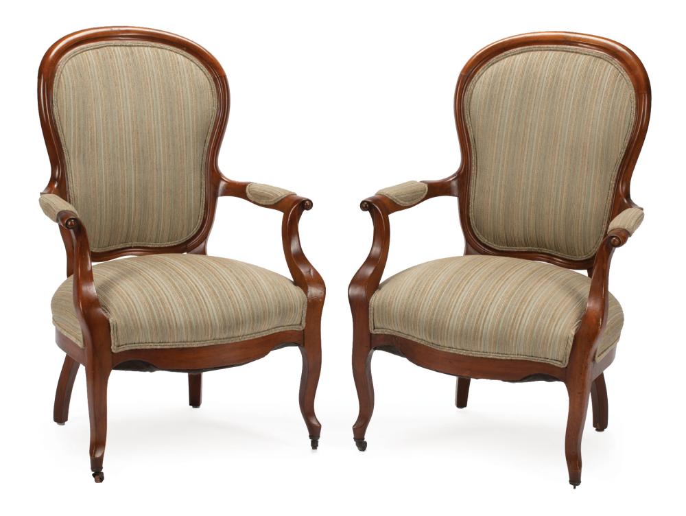 Appraisal: Pair of Louis Philippe-Style Walnut Armchairs cartouche shaped back padded