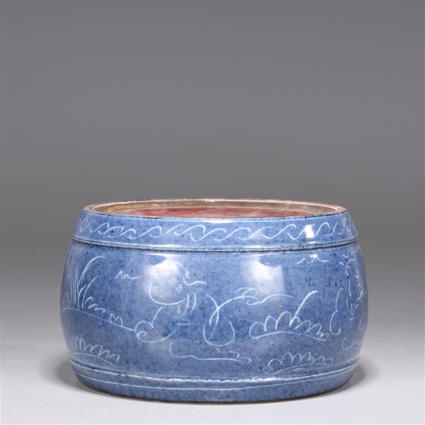 Appraisal: Chinese porcelain circular form blue glazed ink stone with mark