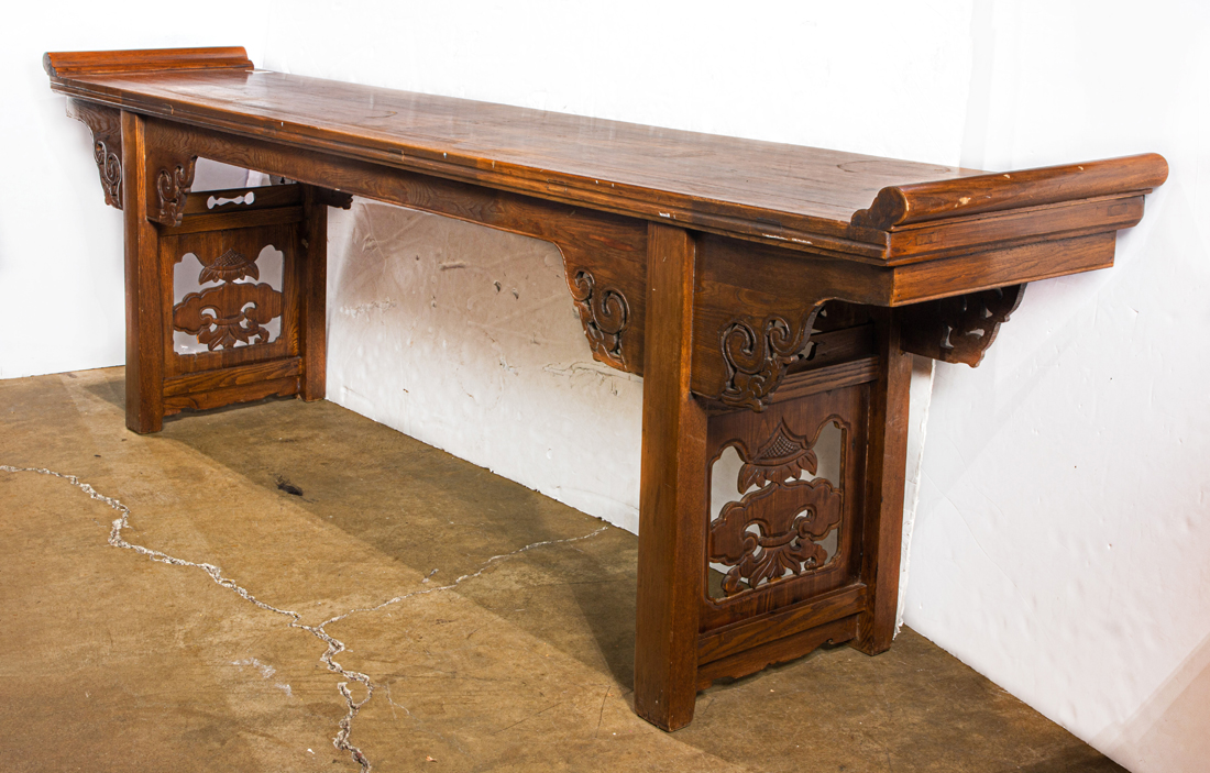 Appraisal: Chinese elm altar table with everted flanges and carved aprons