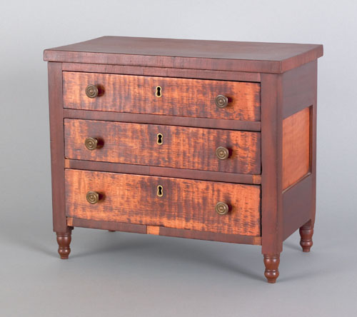 Appraisal: Pennsylvania miniature mahogany and curly maple chest of drawers ca