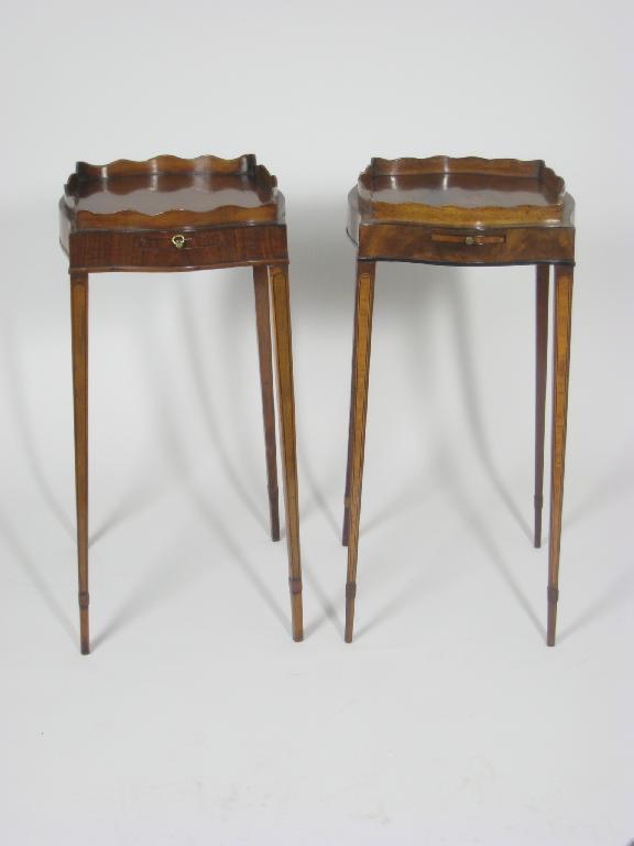 Appraisal: Pair of mahogany Kettle Stands with shaped galleries on inlaid