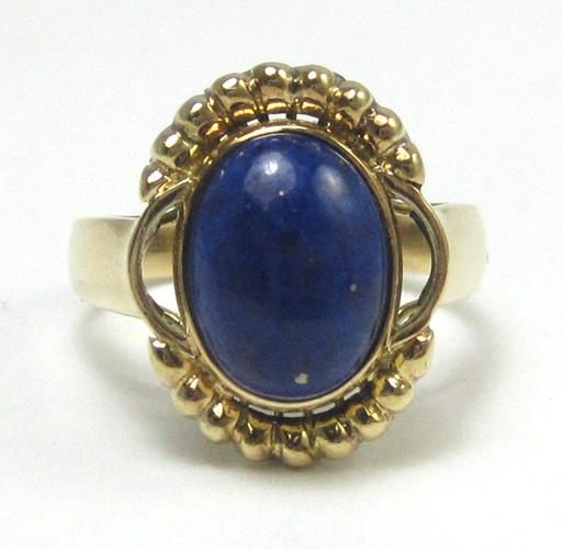 Appraisal: LAPIS LAZULI AND FOURTEEN KARAT GOLD RING set with a