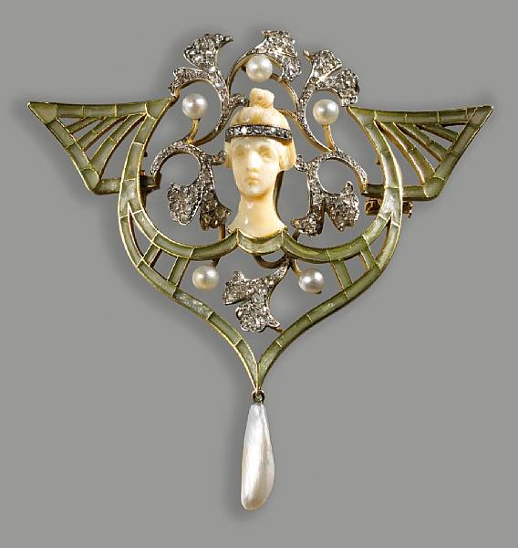 Appraisal: An art nouveau diamond pearl green enamel platinum and eighteen