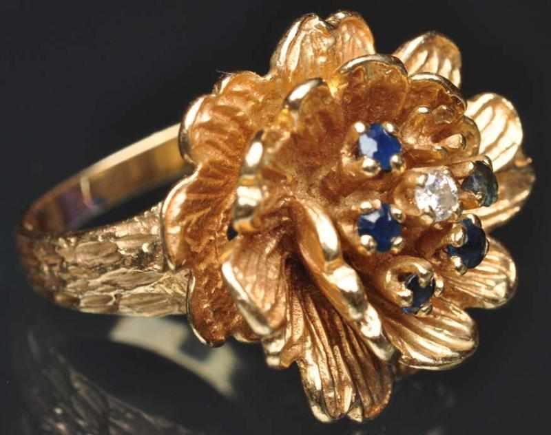 Appraisal: K Y Gold Floral Ring With one single diamond and