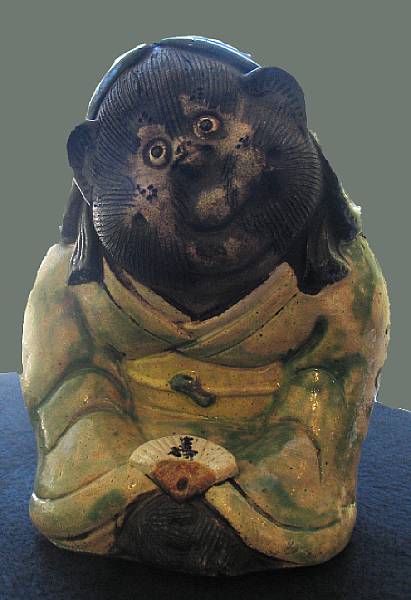 Appraisal: A folk pottery model of a badger Early th Century