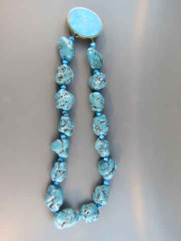 Appraisal: Turquoise Necklace large nuggets gold on silver clasp long