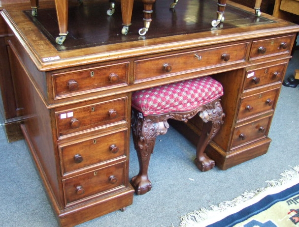 Appraisal: A th century mahogany pedestal desk the gilt leather top