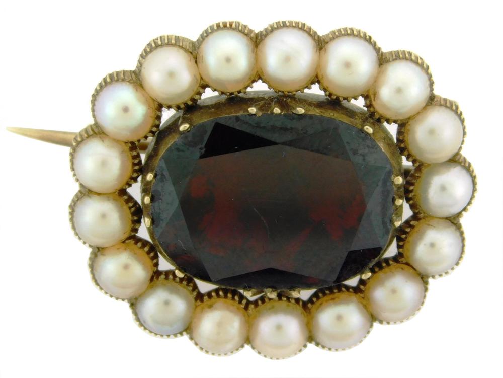 Appraisal: JEWELRY K Victorian garnet and pearl pin oval with scalloped