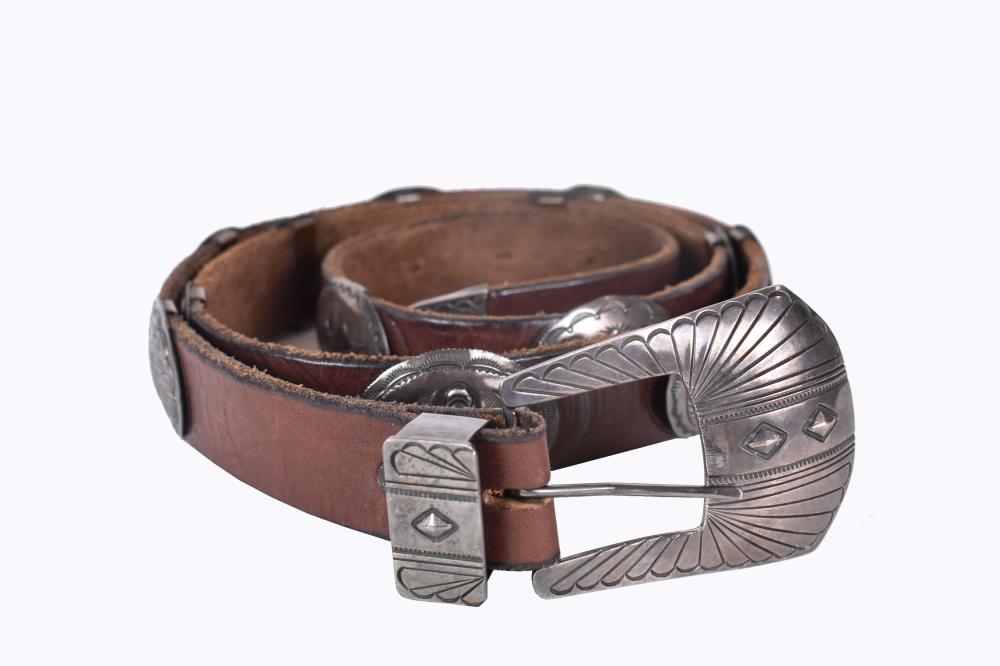 Appraisal: NAVAJO SILVER-MOUNTED LEATHER CONCHO BELTThe buckle unmarked The strap with