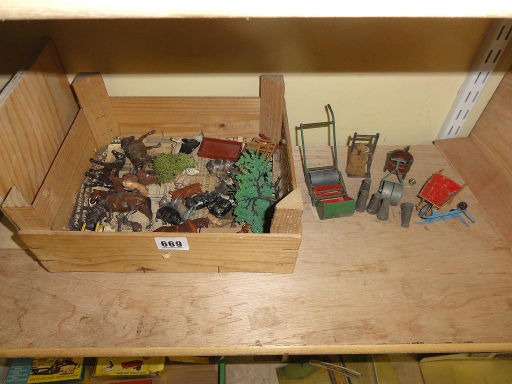 Appraisal: A Dinky die cast garden set including a lawn mower