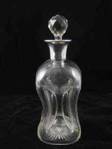 Appraisal: A whisky decanter the body rectangular with four very deep