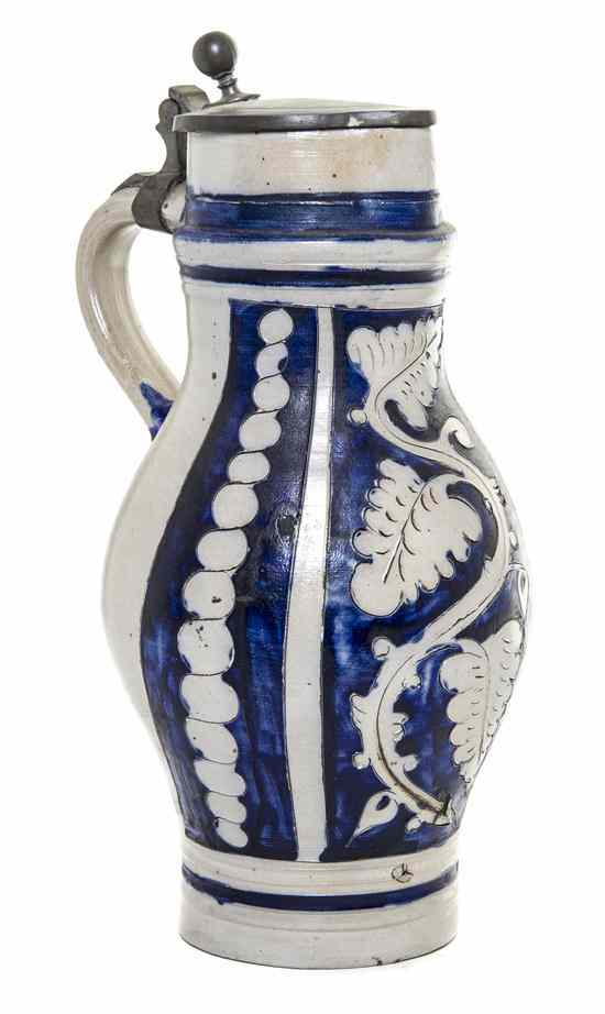 Appraisal: A German Salt Glaze Pitcher having a pewter lid over