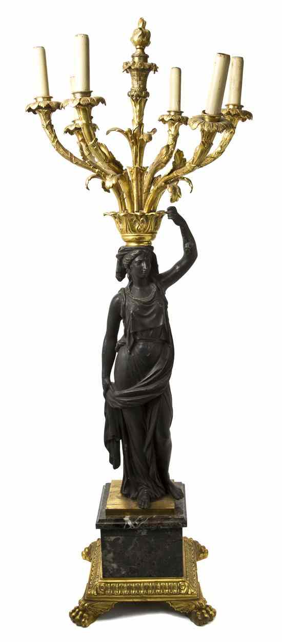 Appraisal: An Empire Style Gilt and Patinated Bronze Six-Light Candelabrum cast