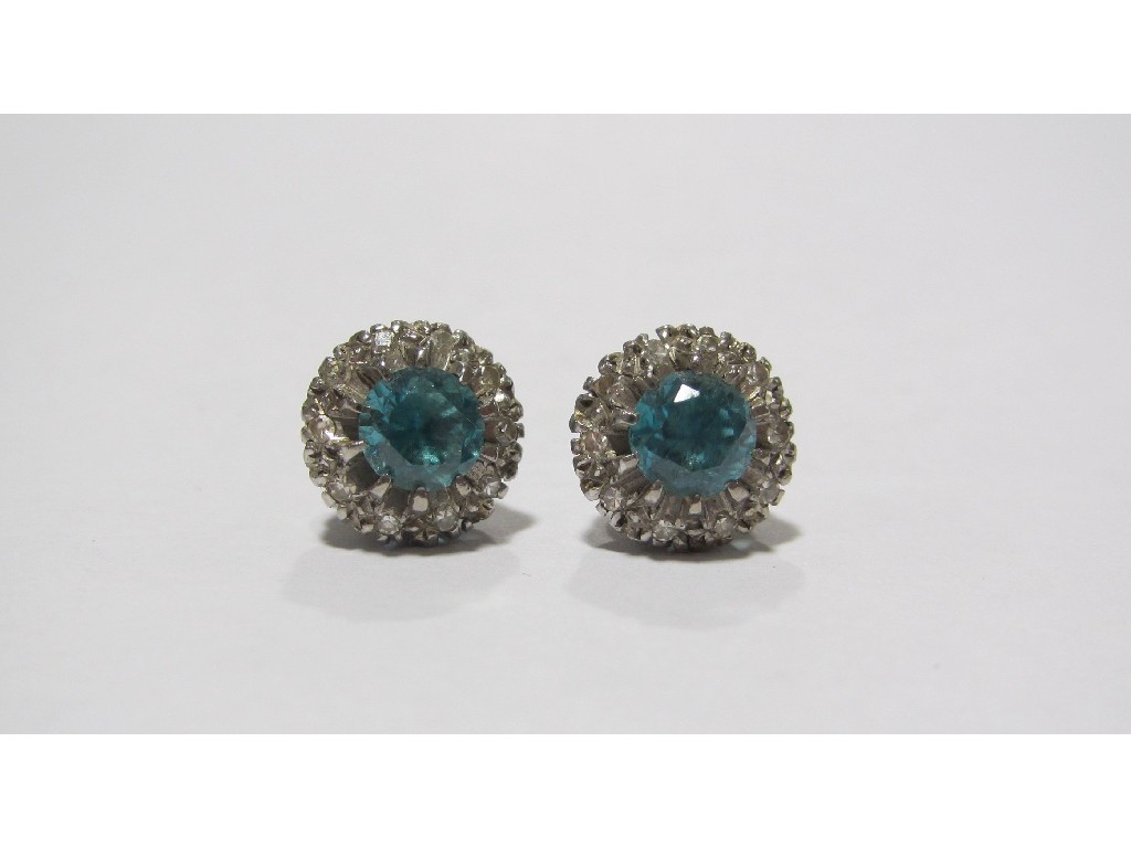 Appraisal: Edwardian white metal aquamarine and diamond cluster stud earrings