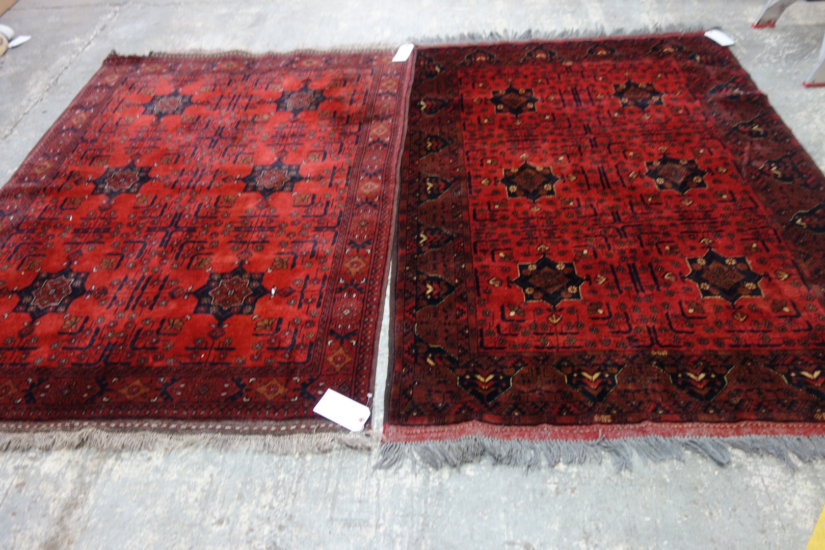 Appraisal: Two Beshir rugs the madder fields in six sections each