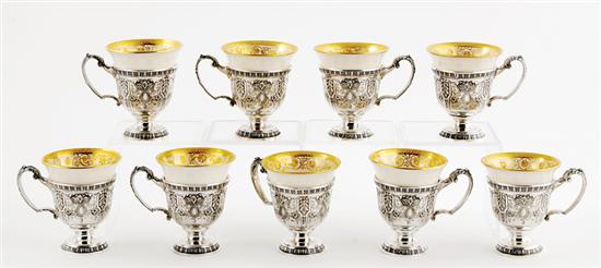 Appraisal: American sterling demitasse set circa Renaissance design fitted with gilt