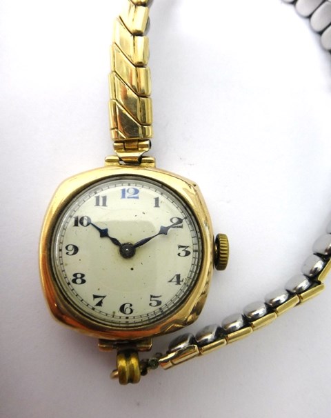 Appraisal: A lady's ct gold cushion shape cased wristwatch with a