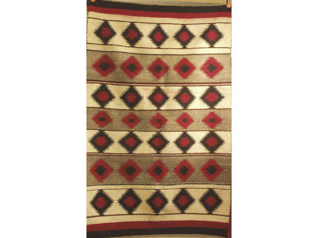 Appraisal: Navajo hand woven textile x snowflake pattern shows stains and