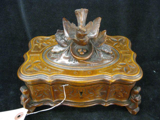 Appraisal: Black Forest Carved Wooden Dresser Box bird nest on top