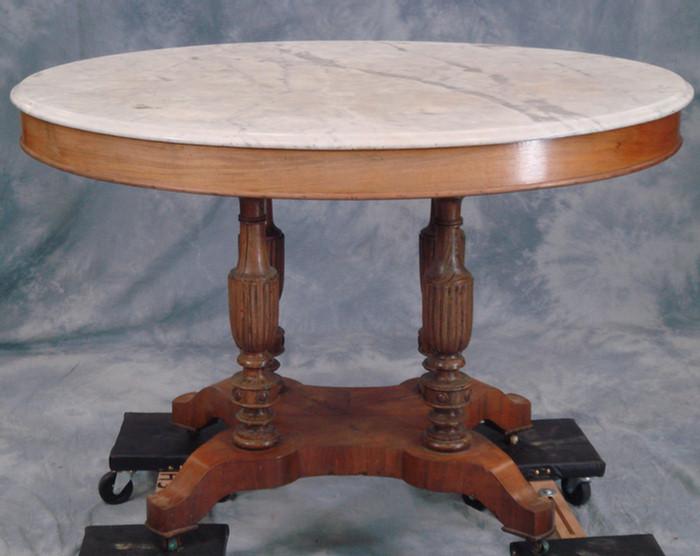 Appraisal: Oval rosewood veneered Victorian marble top center table bleached finish