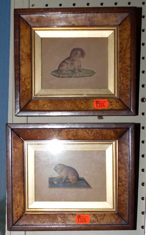 Appraisal: Relief painted watercolor depicting a spaniel and a cat in