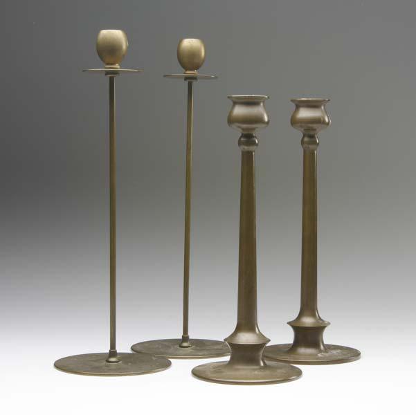 Appraisal: JARVIE STYLE Two pairs of brass candlesticks Unmarked and