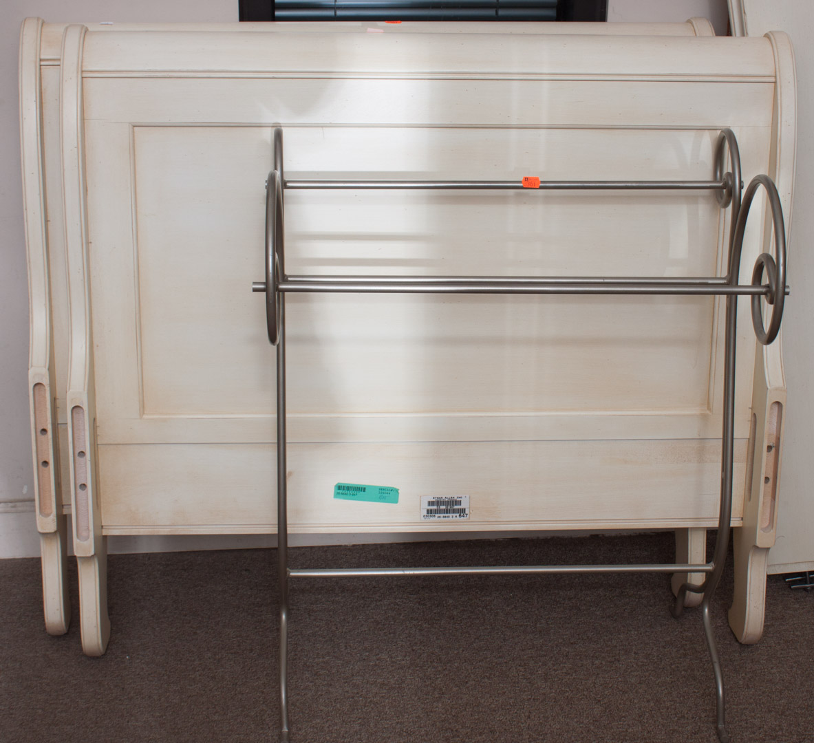 Appraisal: Contemporary bedstead with metal towel rack