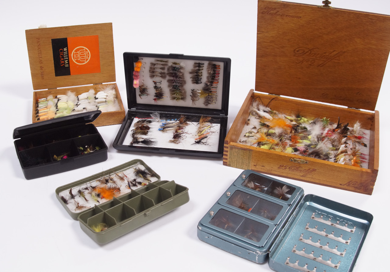 Appraisal: A collection of fishing flies in various fly cases