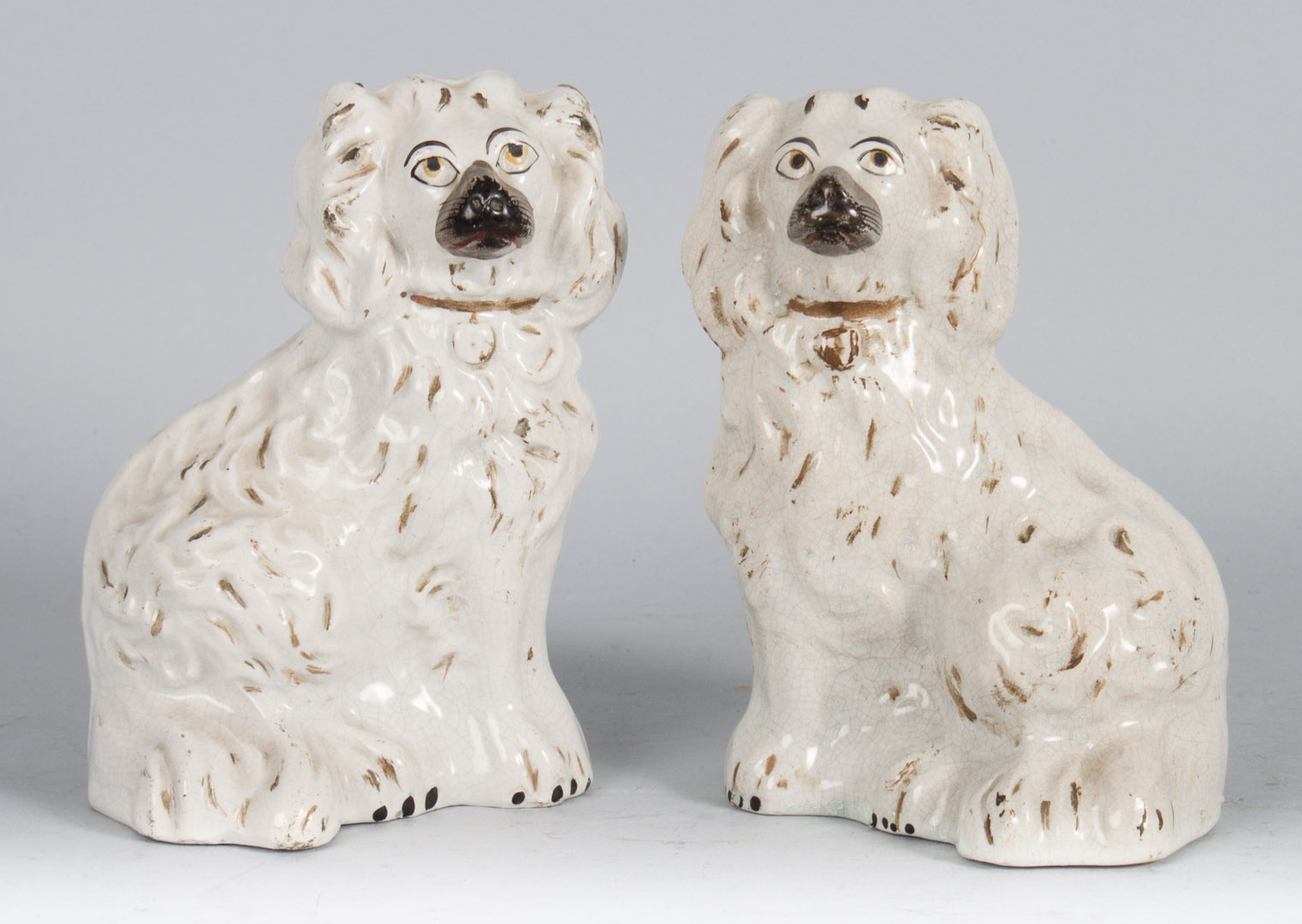 Appraisal: Pair of Staffordshire King Charles spaniels mid- th century glazed