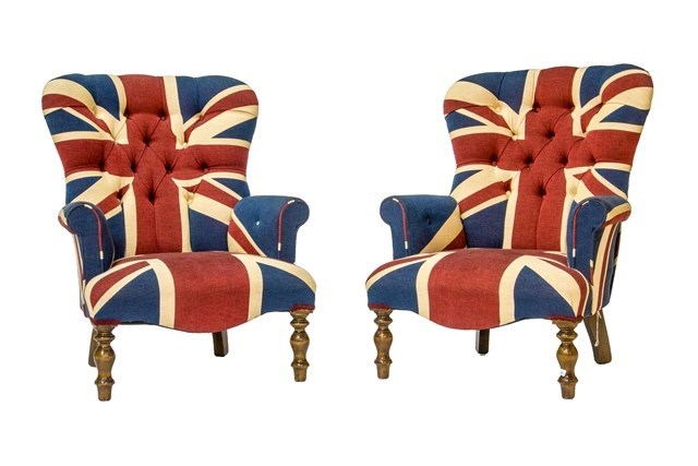 Appraisal: A pair of th century button back easy armchairs with